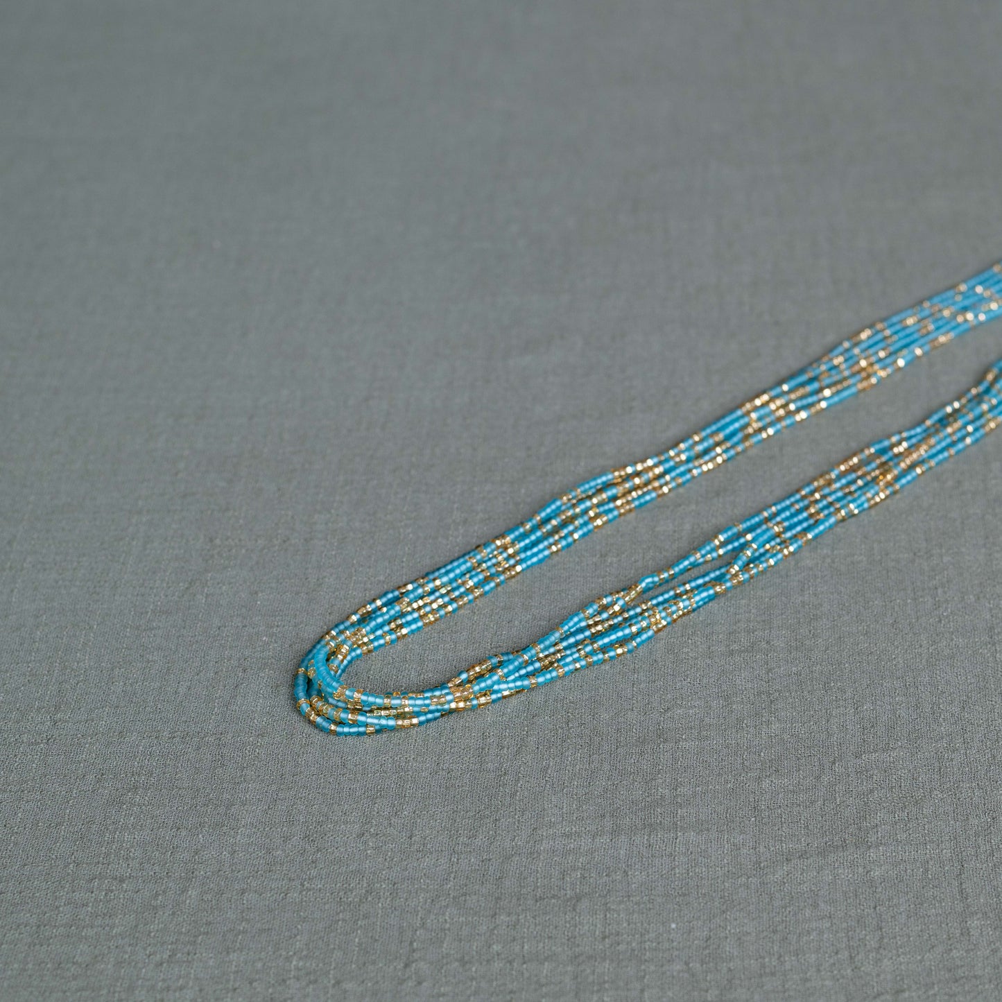 aqua harmony waist beads – handmade Ghanaian body jewelry by Tòma Lina