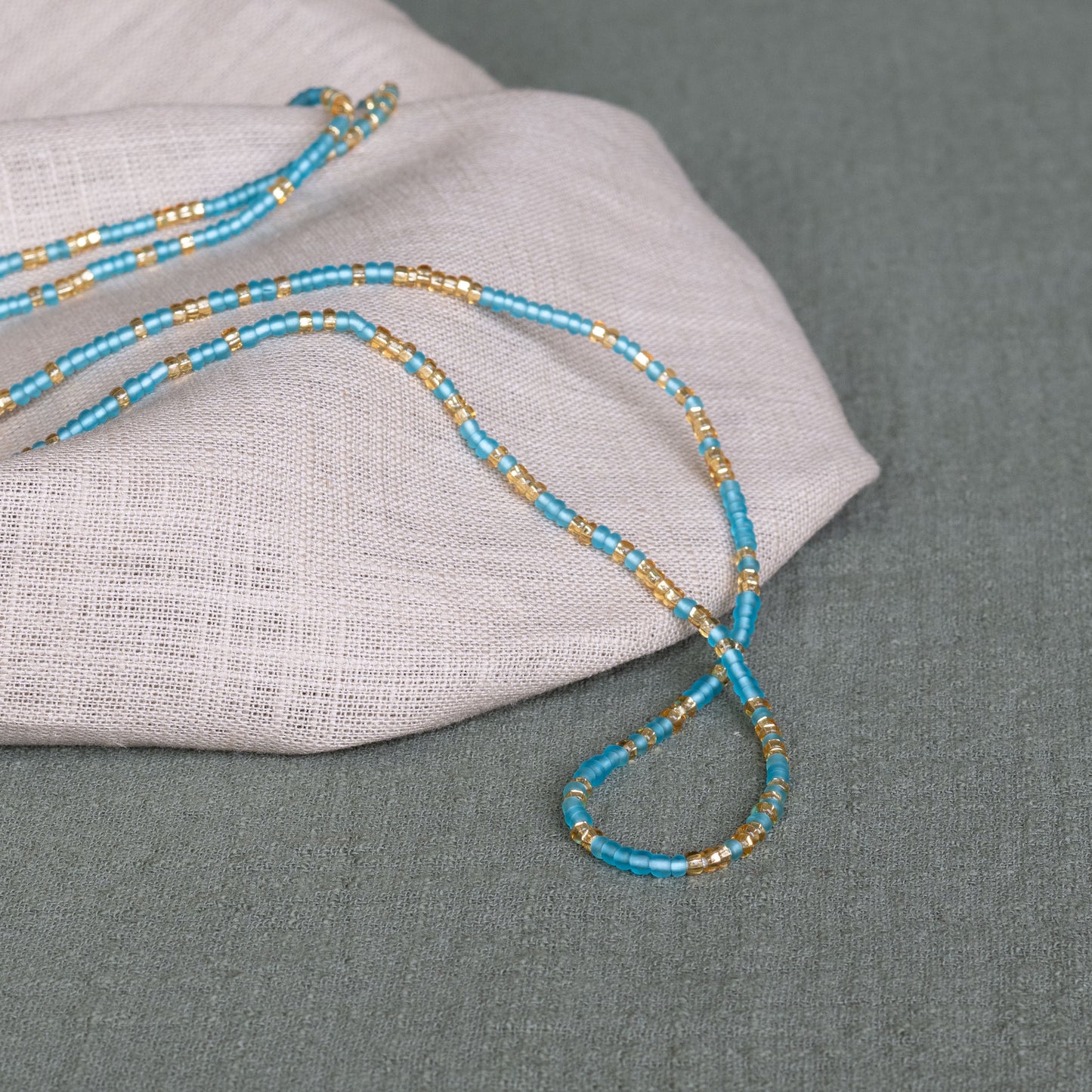 aqua harmony waist beads – handmade Ghanaian body jewelry by Tòma Lina