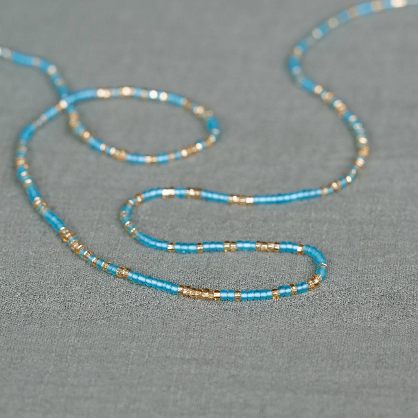 aqua harmony waist beads – handmade Ghanaian body jewelry by Tòma Lina