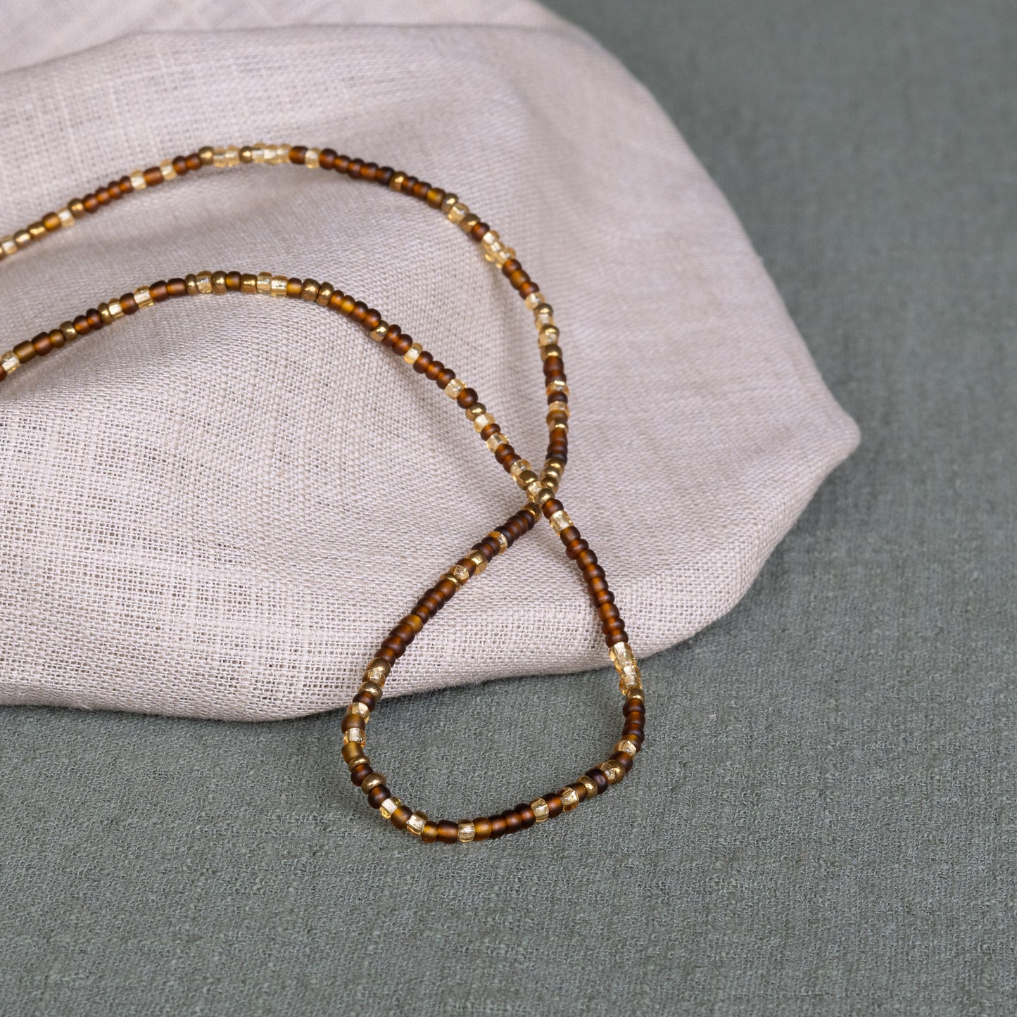 Brown Sugar waist beads in brown – handmade Ghanaian body jewelry by Tòma Lina