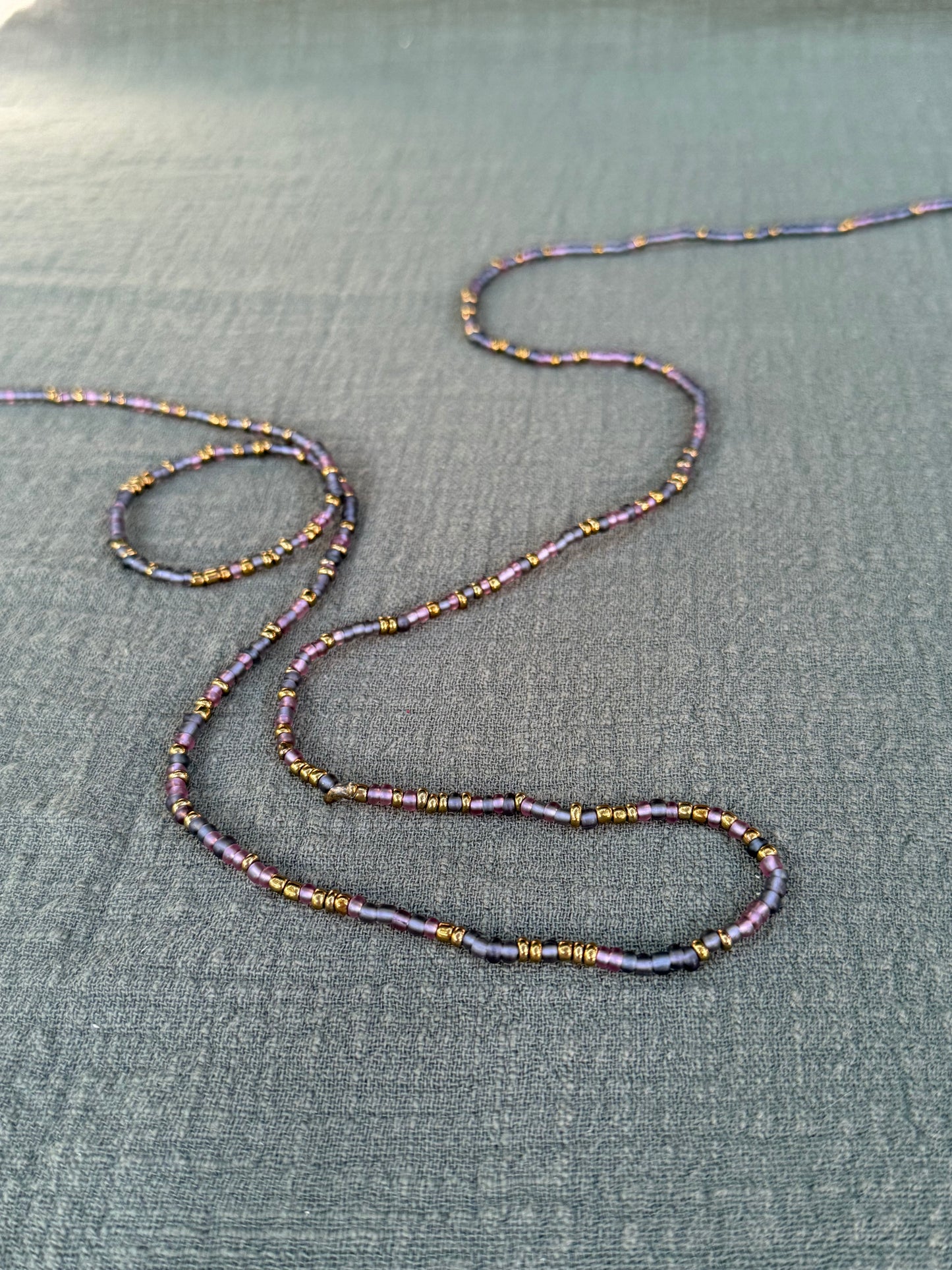 Purple Rain waist beads – handmade Ghanaian body jewelry by Tòma Lina