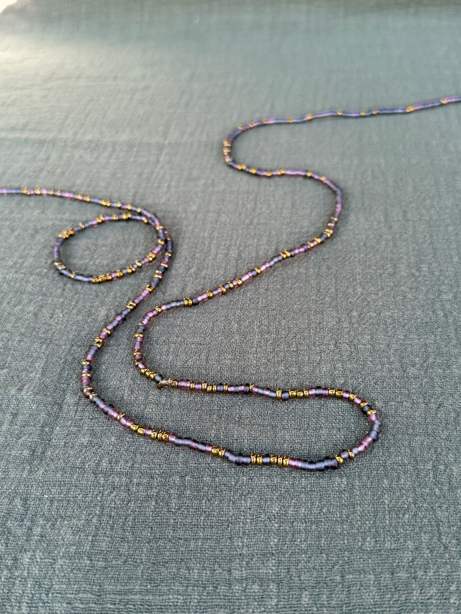 Purple Rain waist beads – handmade Ghanaian body jewelry by Tòma Lina