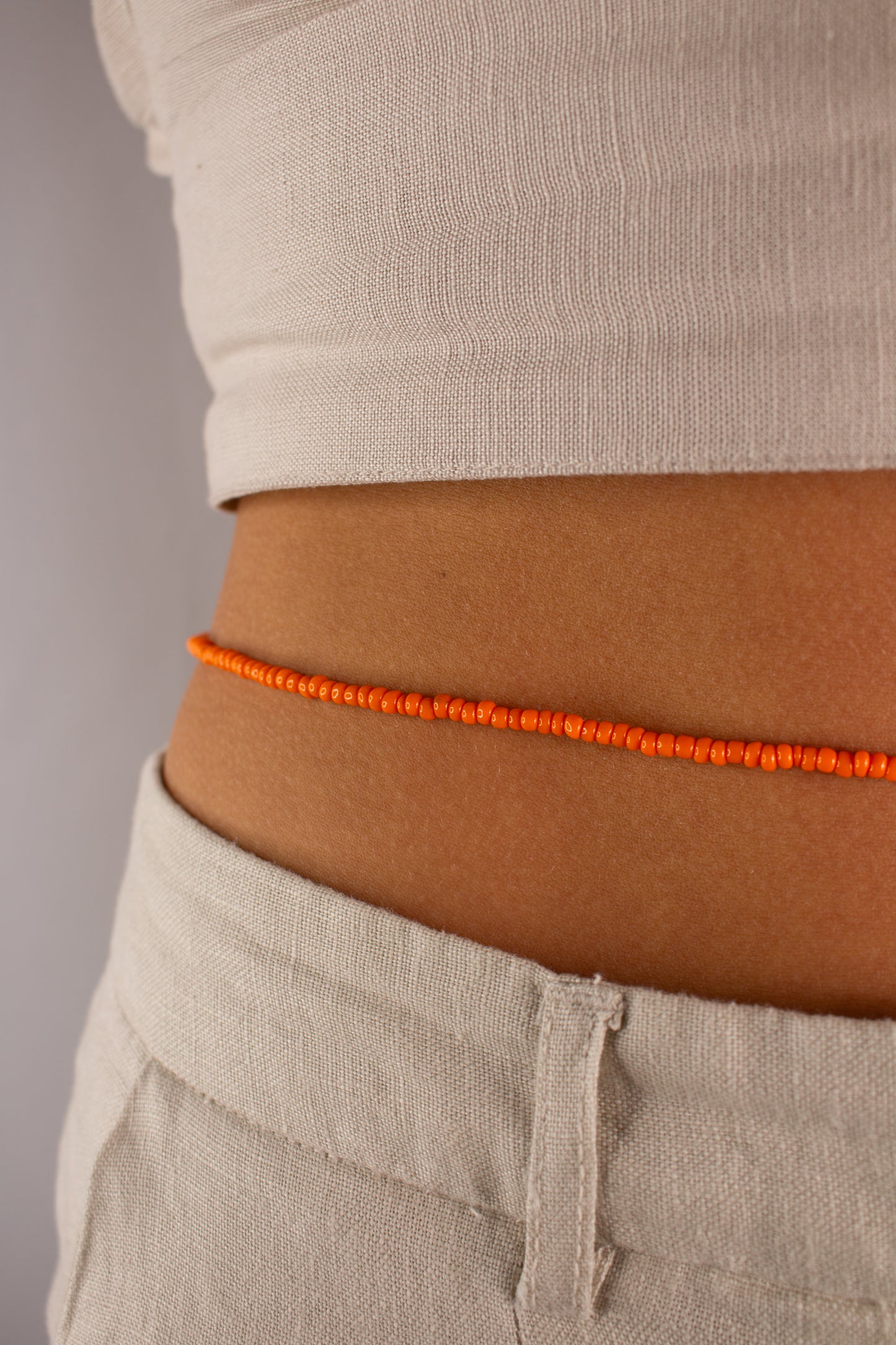 How to wear pumpkin spice waist beads from Tòma Lina – handmade body jewelry