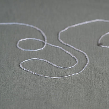 Tòma Lina Clear Beauty waist bead, handmade with transparent Ghanaian beads symbolizing clarity, purity and a fresh new beginning.