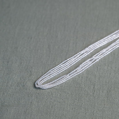 Tòma Lina Clear Beauty waist bead, handmade with transparent Ghanaian beads symbolizing clarity, purity and a fresh new beginning.