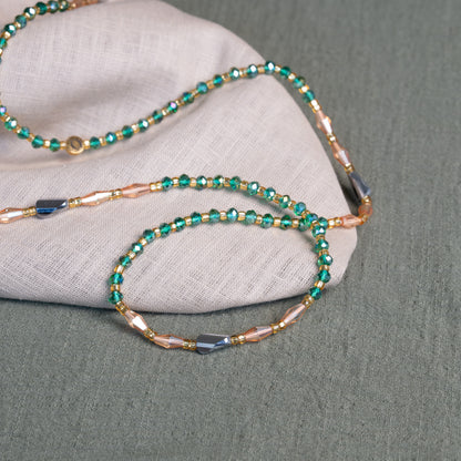 Emerald green and bronze African waist beads – handmade tie-on jewelry symbolizing growth, fire and grounding energy.