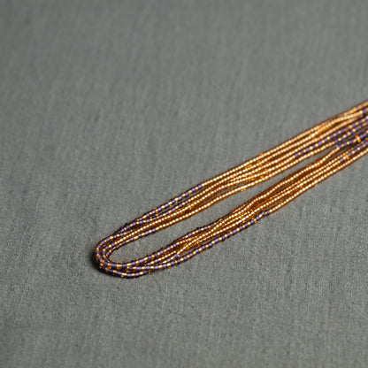 Tòma Lina Lavender waist bead, handmade with authentic Ghanaian beads in a soft purple shade symbolizing creativity, calmness and feminine elegance